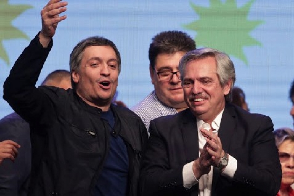 Máximo Kirchner y el presidente, ahora tambien del PJ, Alberto Fernández.