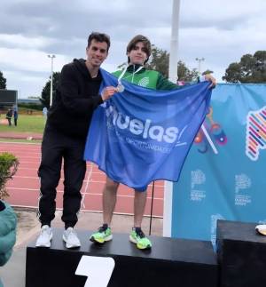 Sim&oacute;n Barbieri, medalla asegurada en las ultimas ediciones, junto a su entrenador Gio Rizzi. 